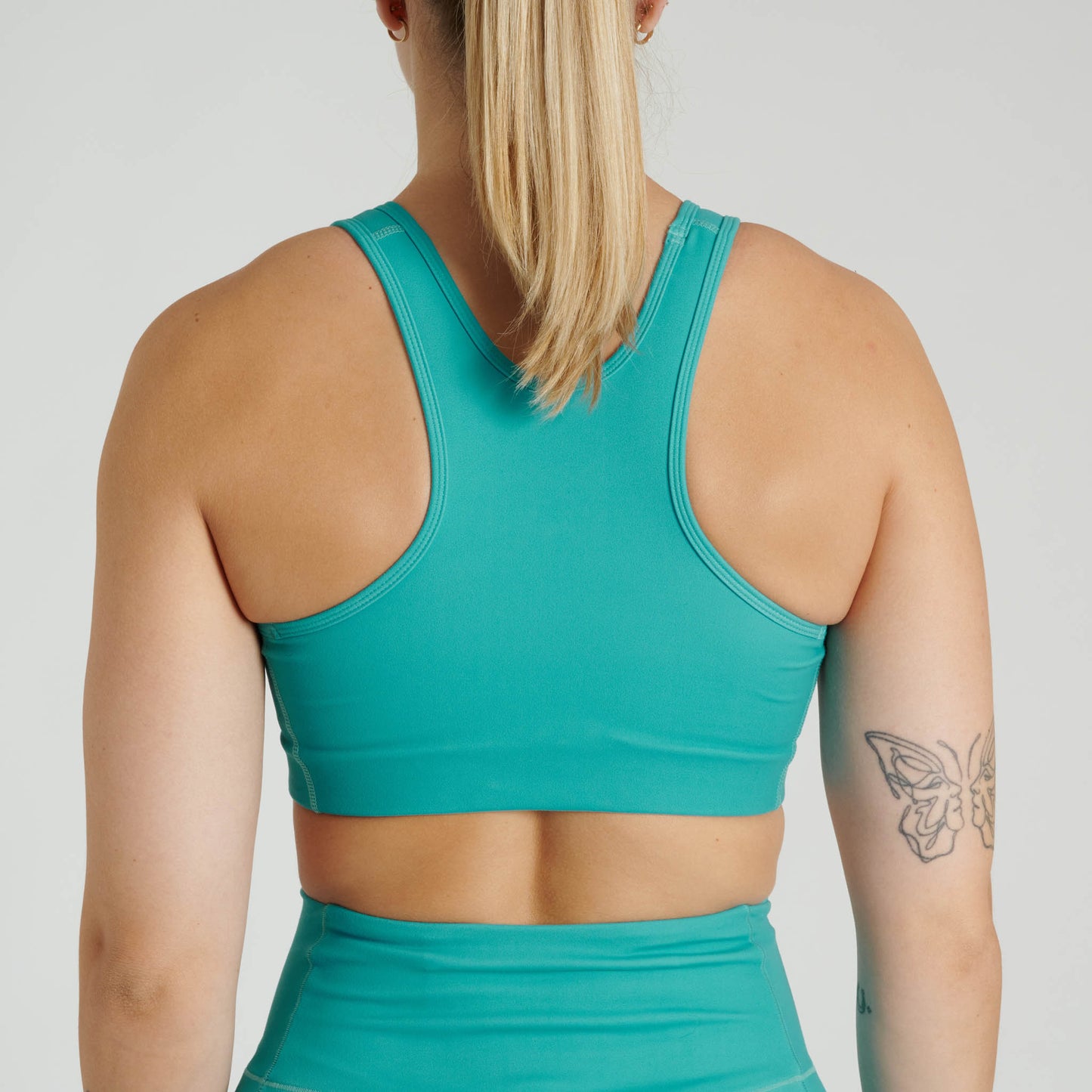 Top sport mujer LOGO ABX130